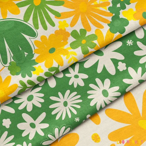 Floral fabric patterns in green, yellow, and white on a white background