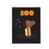 Greeting card with a cartoon dog wearing a hot dog costume and 'BOO' text on a black background.