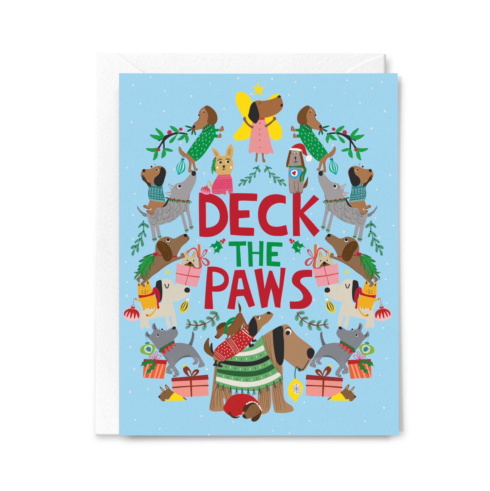 Christmas card with dogs and 'Deck the Paws' text on a light blue background