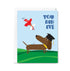 Graduation-themed greeting card with a dog wearing a cap and diploma, and a red bird flying above, on a light blue background.