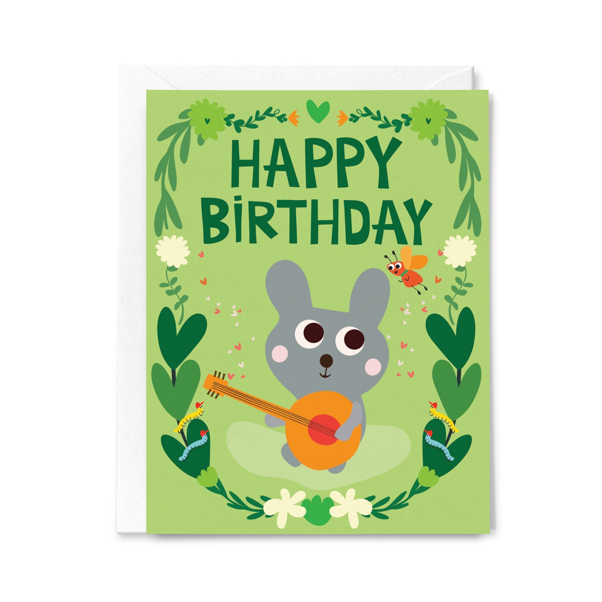 Birthday card with a cartoon rabbit playing a guitar on a green background