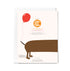 Greeting card with a dog and red balloon illustration on a white background