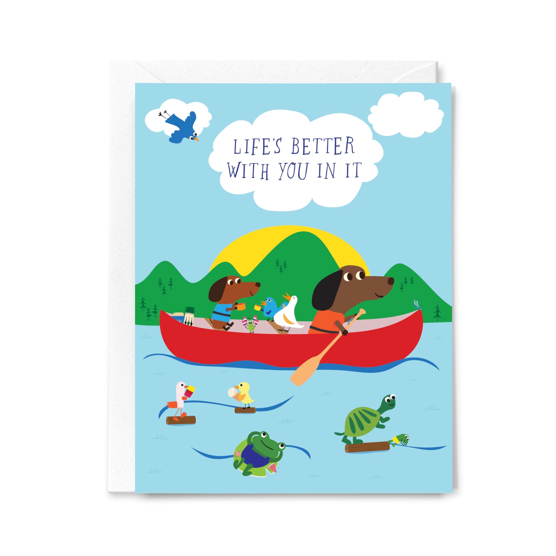 Greeting card with cartoon dogs in a red canoe and text 'Life's better with you in it' on a blue background.